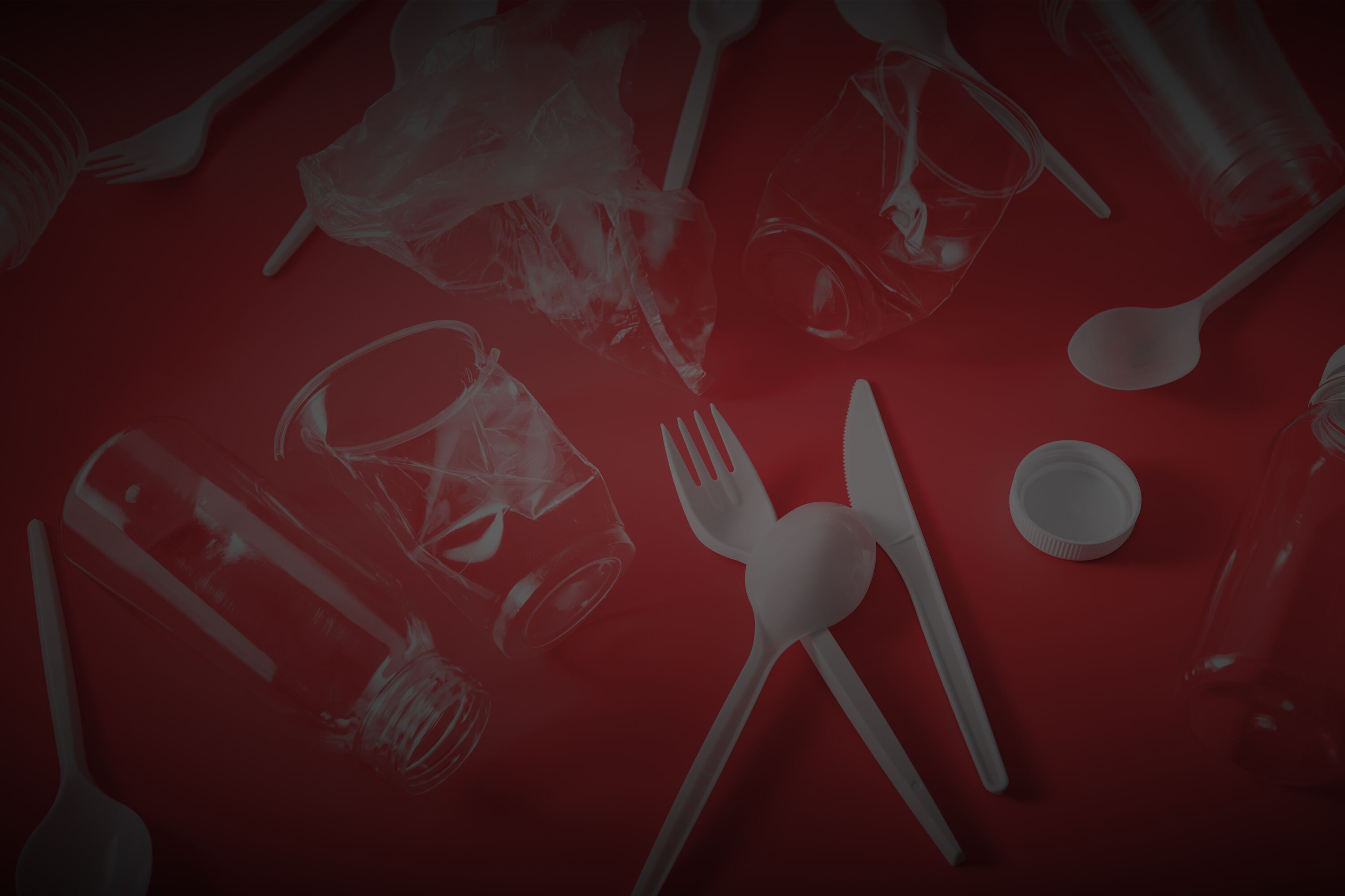 single use plastic bottles, cups, forks, spoons. concept of recycling plastic, plastic waste