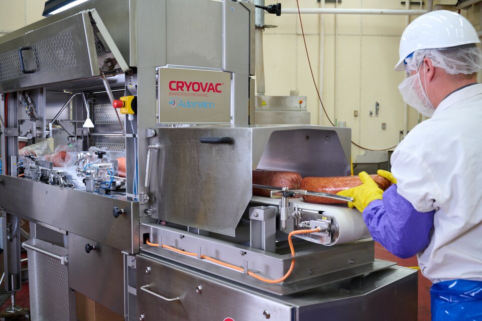 BL75-automated-bag-loader-processed-ham-product-loading-3