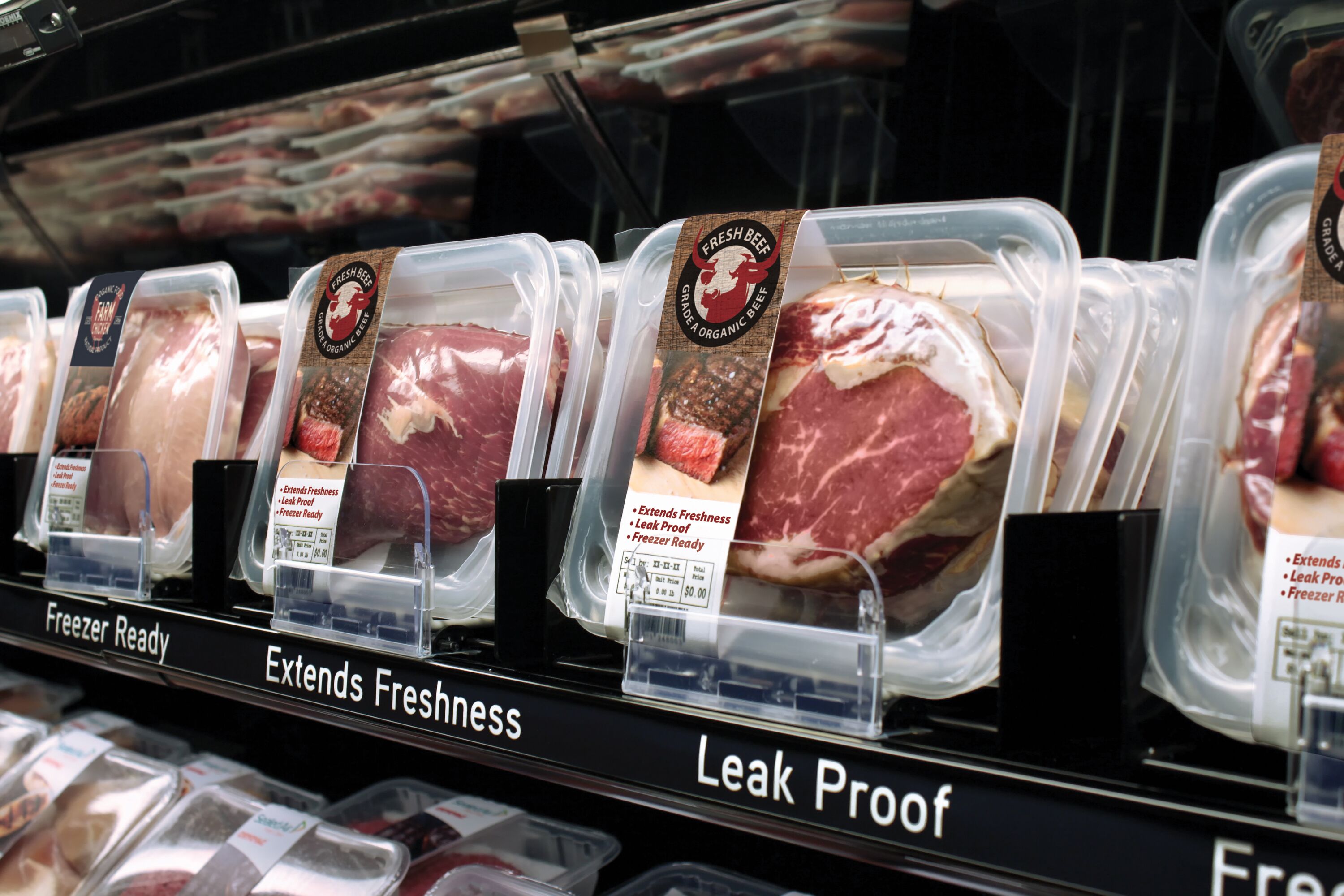 Grocery Shelf With Cryovac Case Ready Beef Packaging
