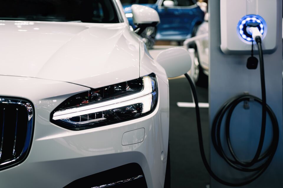 Power supply for hybrid electric car charging battery. Eco car concept